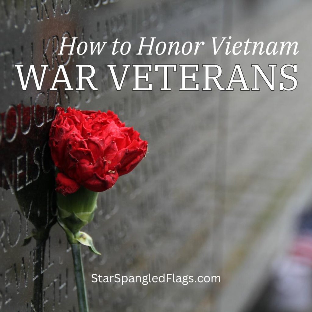 Honor Vietnam War Veterans with rose in front of memorial wall